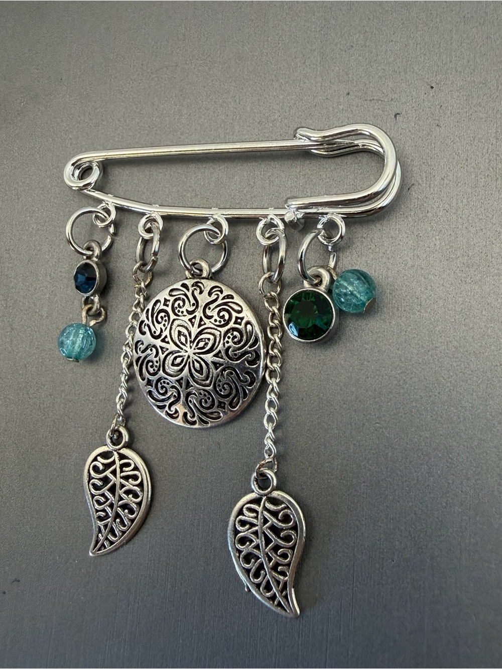 Silver Filigree Leaf and Medallion Safety Pin Brooch with Blue and Green Accent